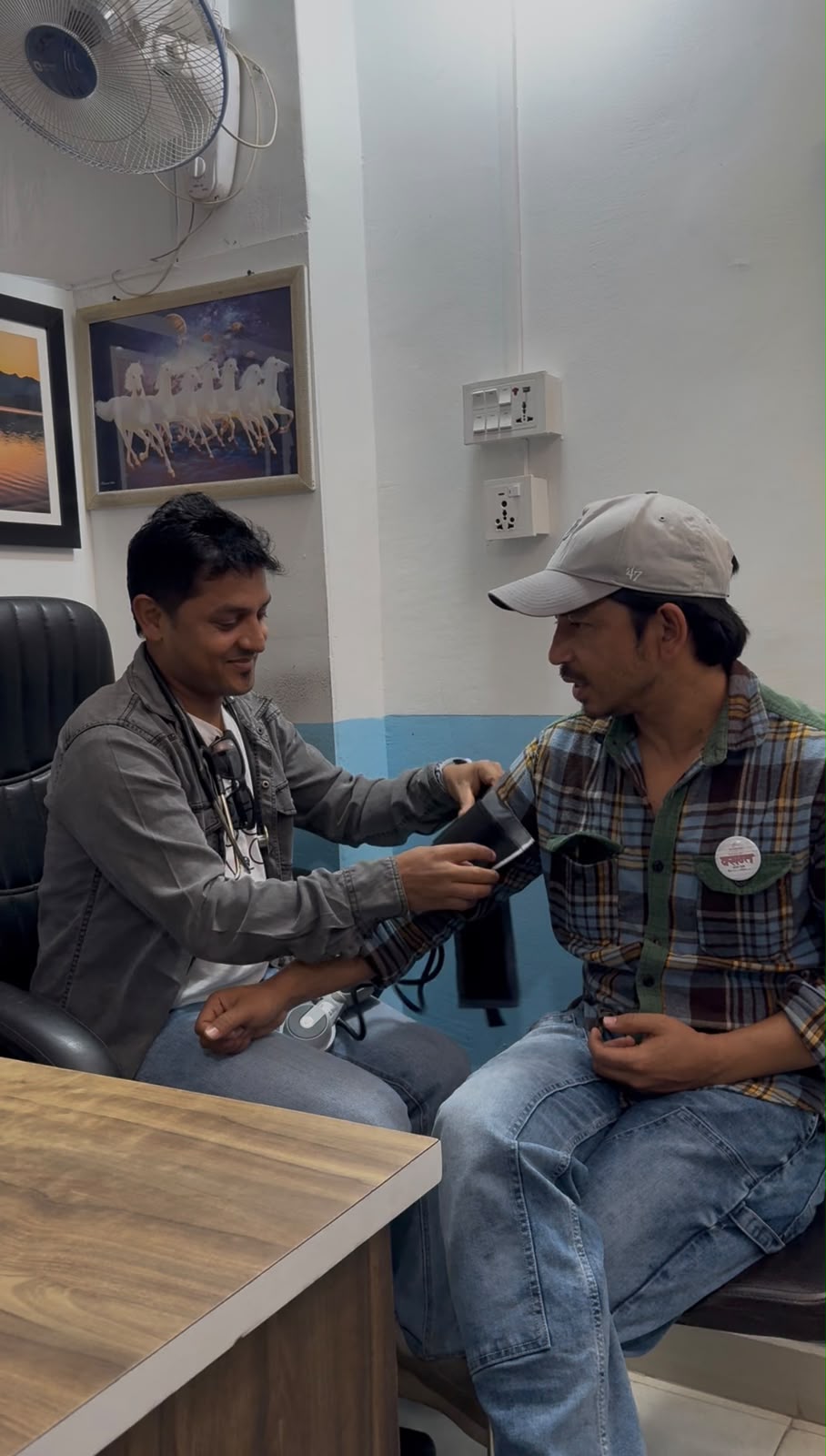 Dr. Sagar Pokherel checking a guest's health